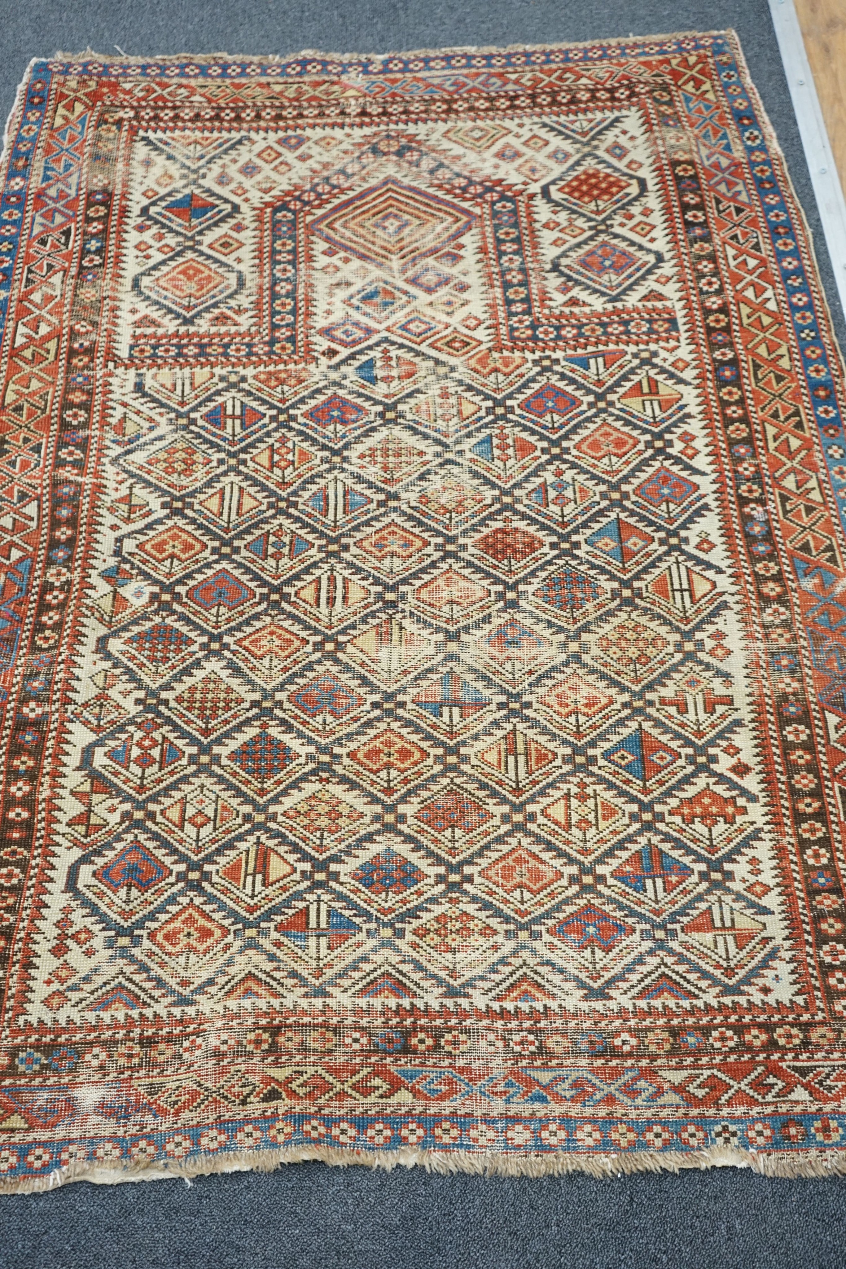 An antique Daghestan prayer rug, 144 x 101cm